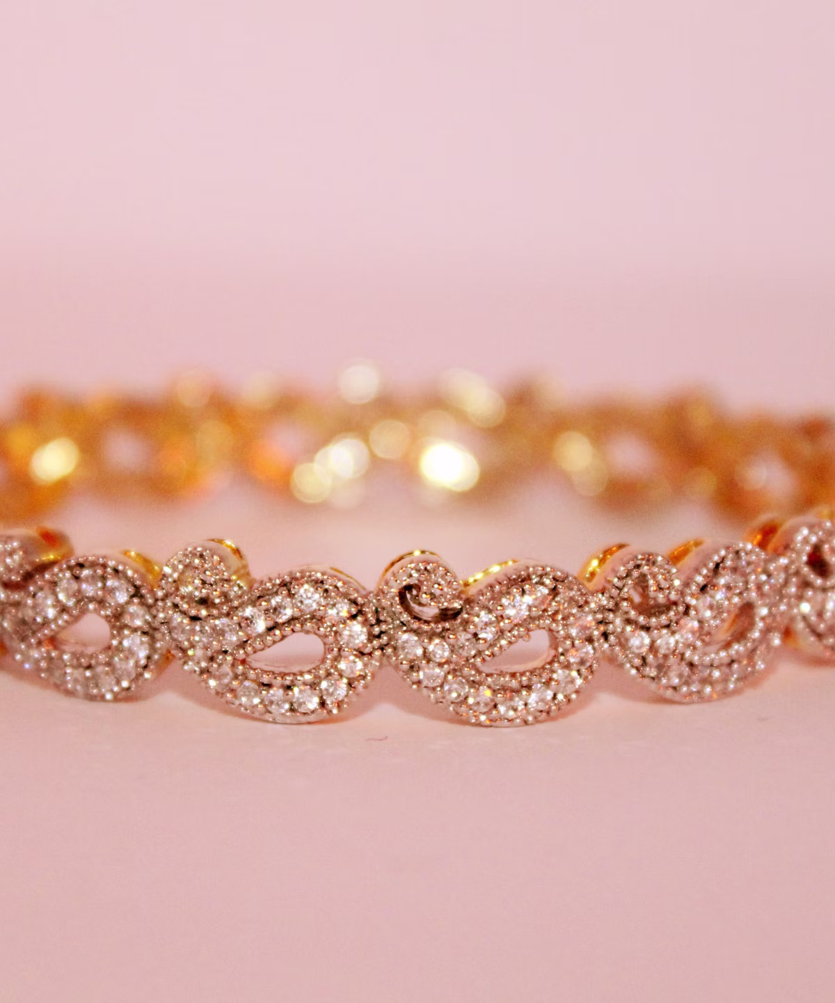 Gold stainless steel rings and jewellery components on a production bench