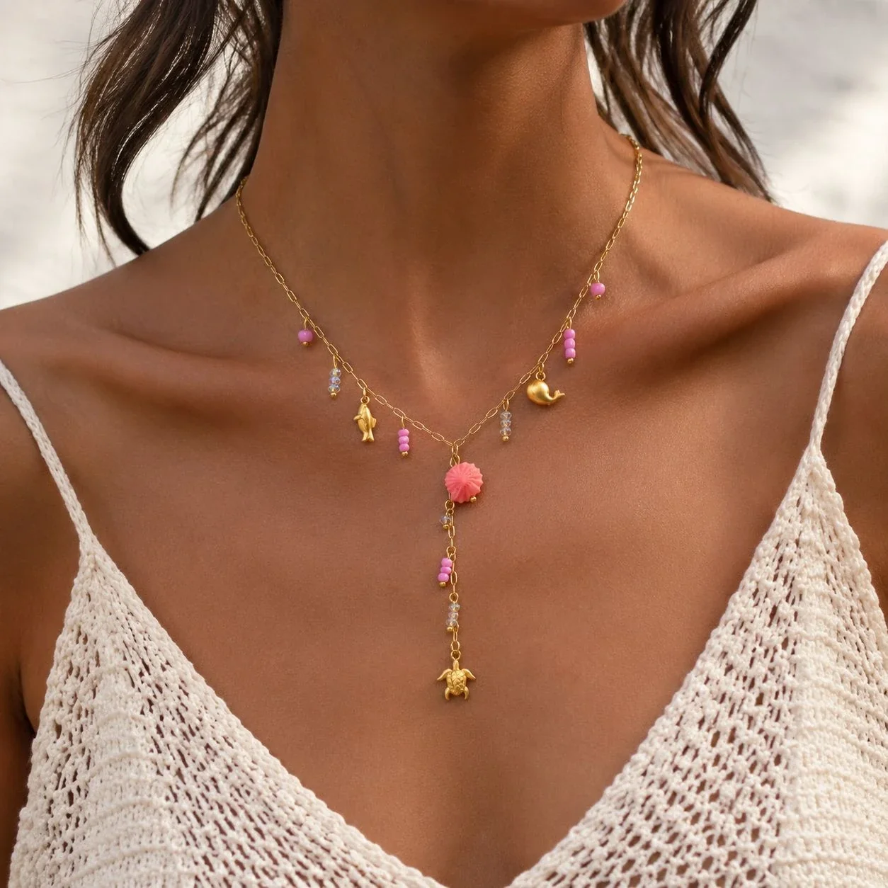 Y-ketting met bedels van zeeschildpad en schelp, verguld productfoto