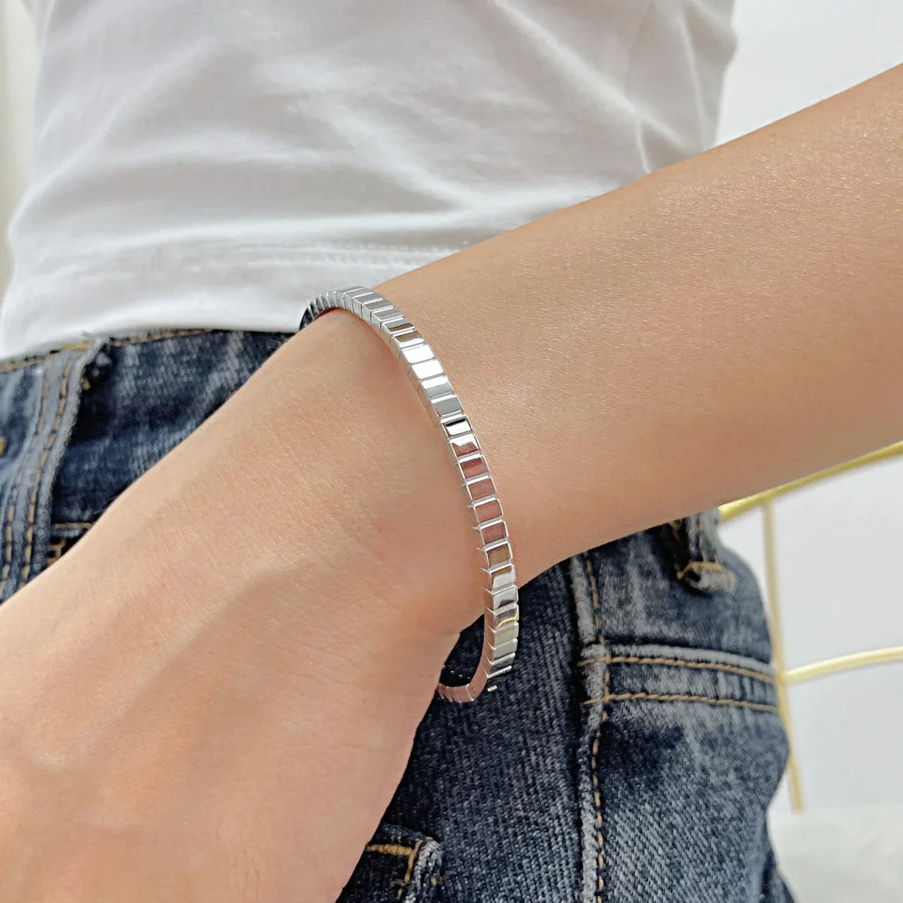 Armring met vierkante kastzettingen met zirkonia, roestvrij staal productfoto