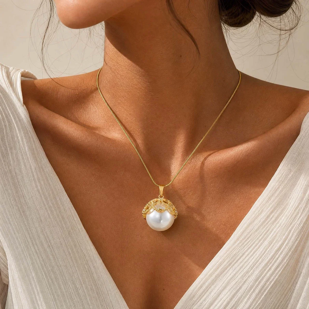 Hangerketting met Pareleffect Druppel en Vergulde Slangenketting productfoto