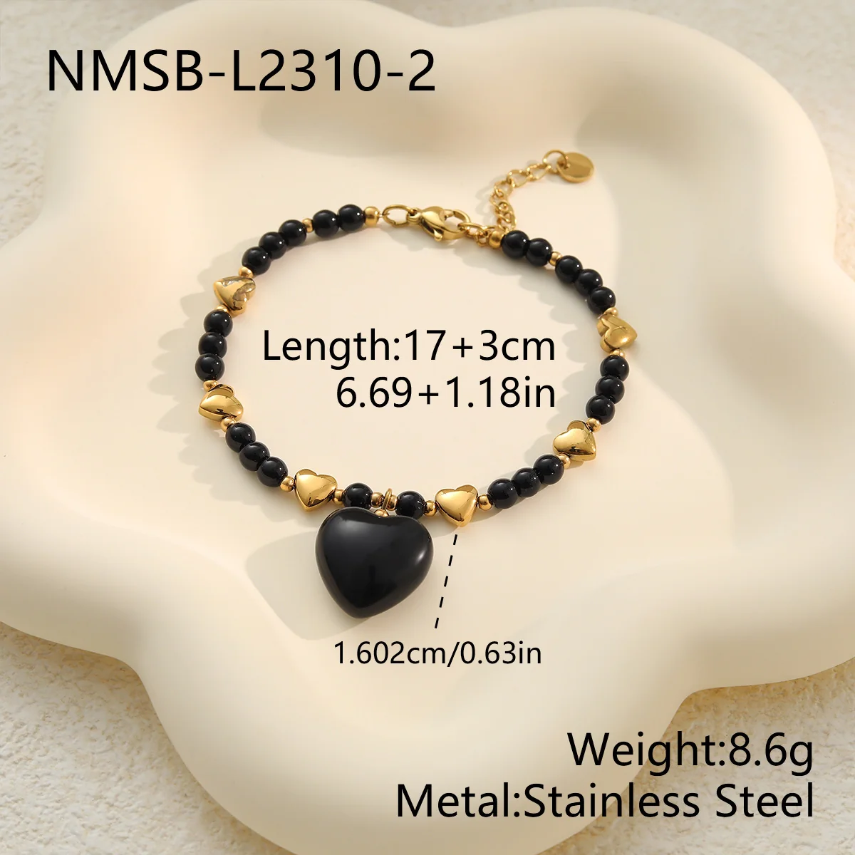 Photo produit : Parure collier et bracelet à perles cœur en acier plaqué or 18K