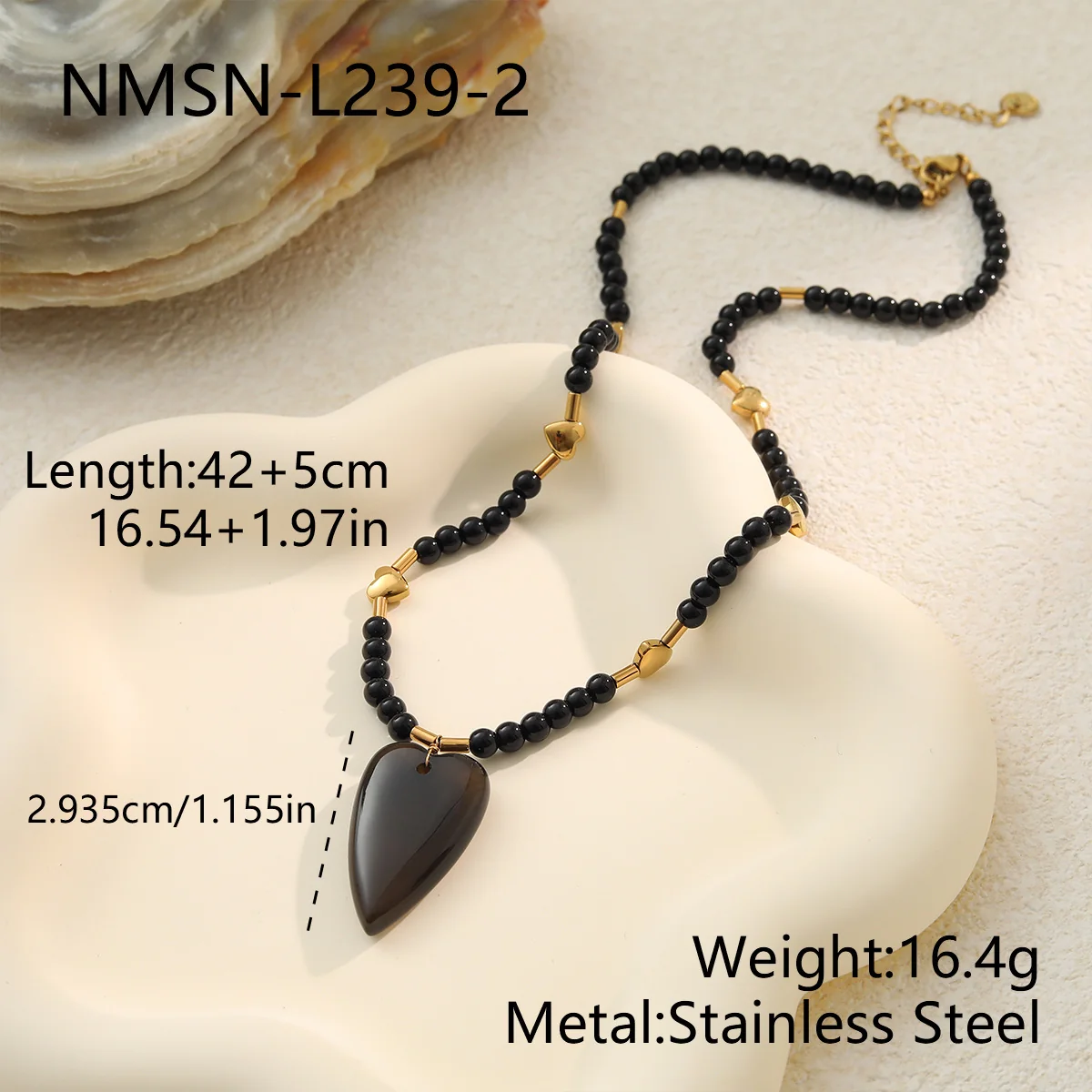 Photo produit : Parure collier et bracelet à perles cœur en acier plaqué or 18K