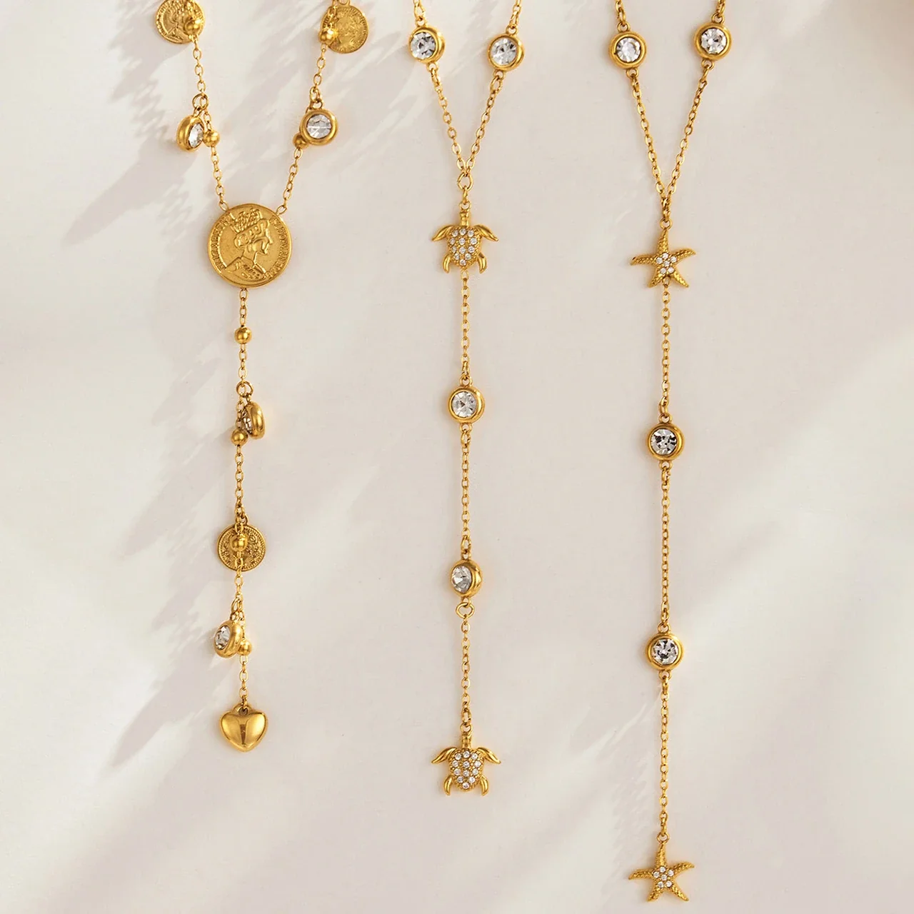 Produktfoto: Y-Collier mit Zirkonia-Motiven in Zargenfassung, Gold-PVD-Edelstahl