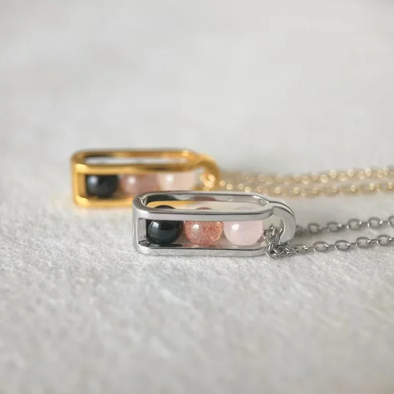 Pendant Necklace with Three Beads and Open Frame, Stainless Steel