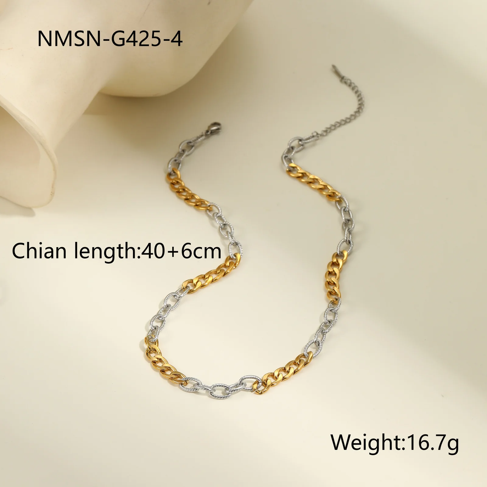 Tweekleurige ketting met gemengde schakels van met 18K goud verguld staal productfoto
