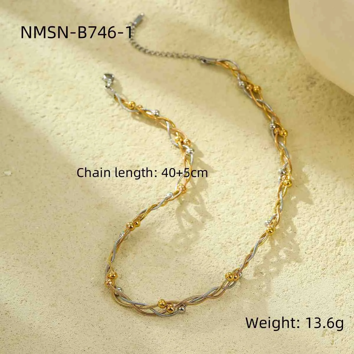 Tweekleurige ketting met gemengde schakels van met 18K goud verguld staal productfoto