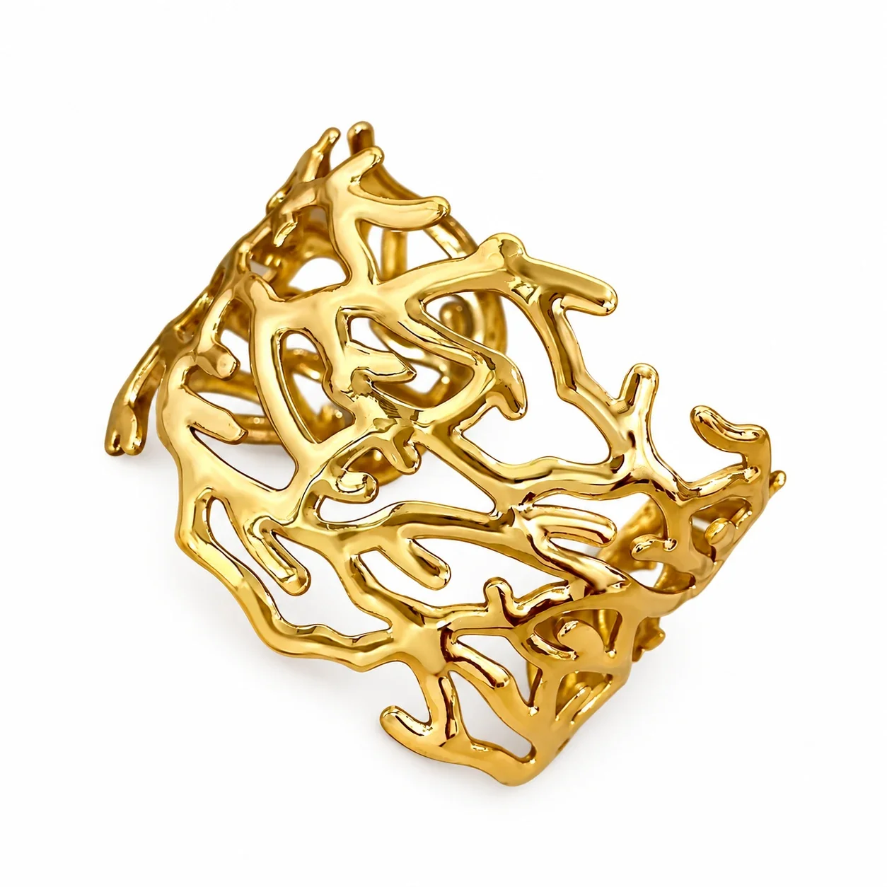 Foto del producto: Brazalete rígido con motivo de ramas caladas, acero chapado en oro