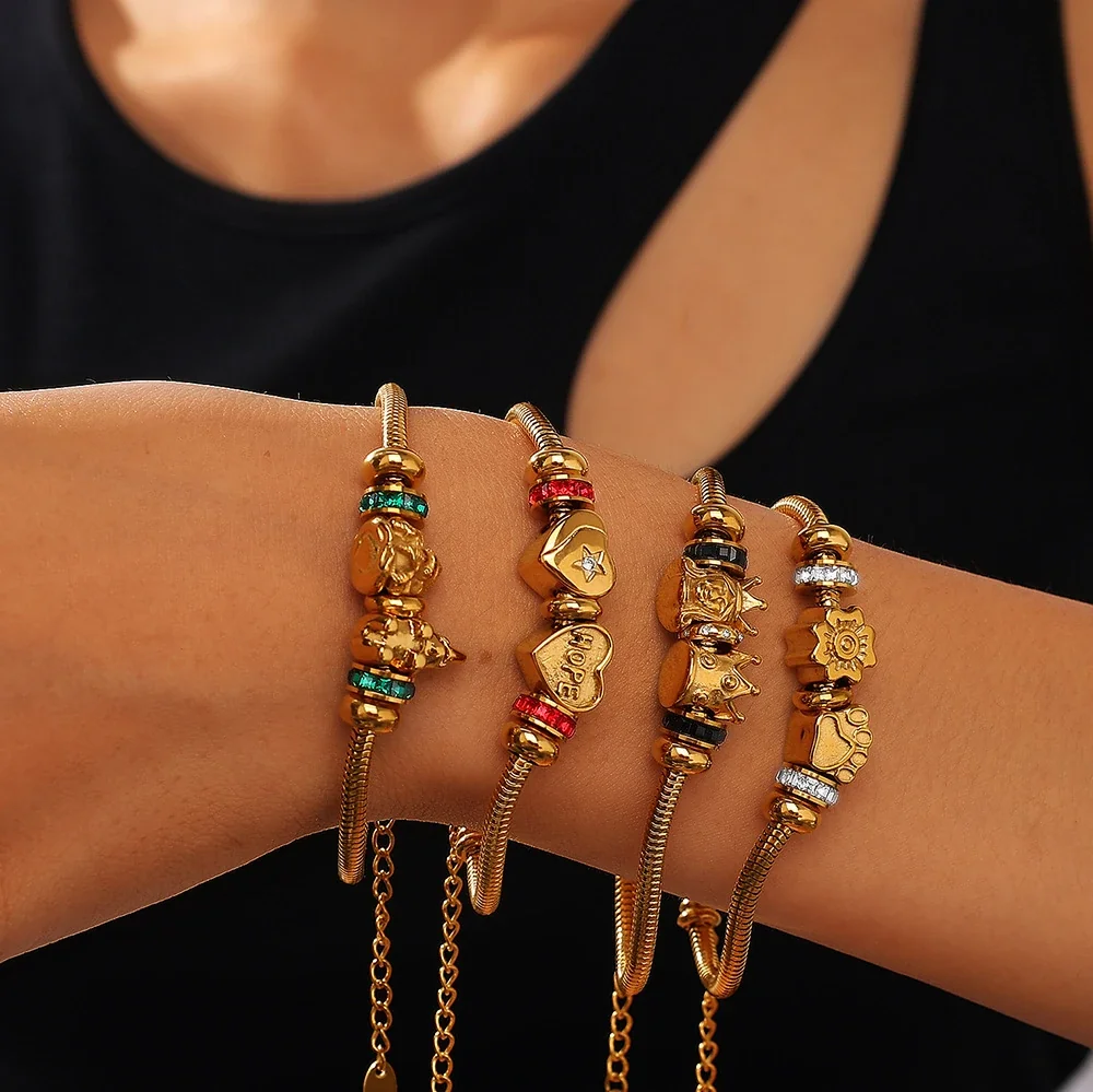 Charm Bracelet with Snake Chain and Animal Motifs, Gold-Plated