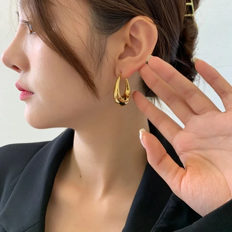 Hoop Earrings with Rounded Teardrop Profile in Stainless Steel