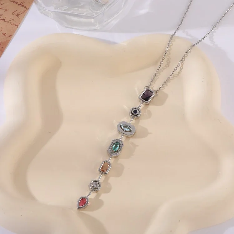 Foto prodotto: Pendant Necklace: Seven Geometric Crystal Stations, Stainless Steel