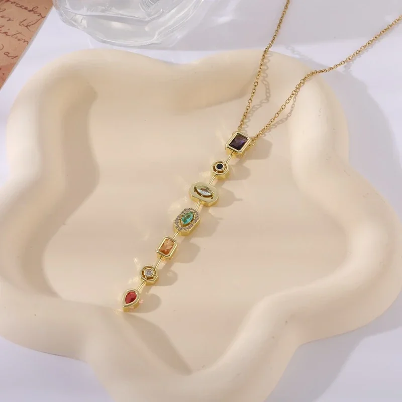 Foto prodotto: Pendant Necklace: Seven Geometric Crystal Stations, Stainless Steel