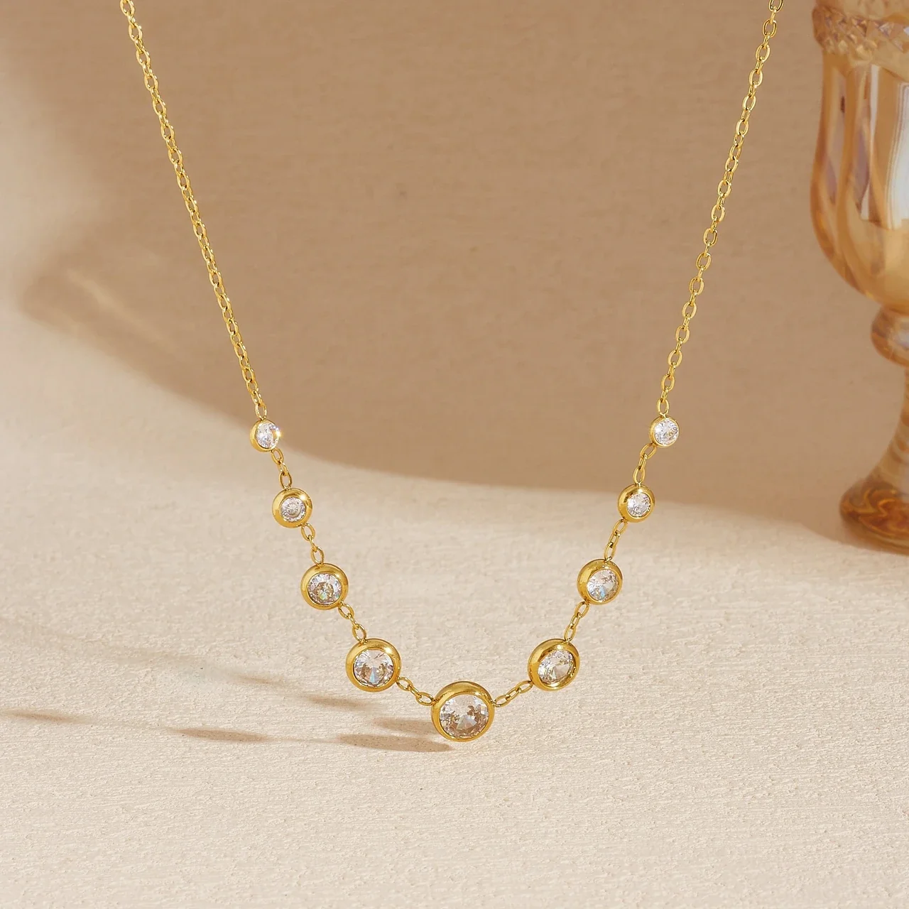 Necklace with Graduated Bezel CZs in Gold-Plated Steel