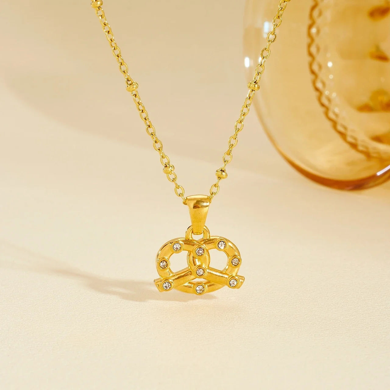 Pendant Necklace with Interwoven Crystal-Set Lines, Gold-Plated