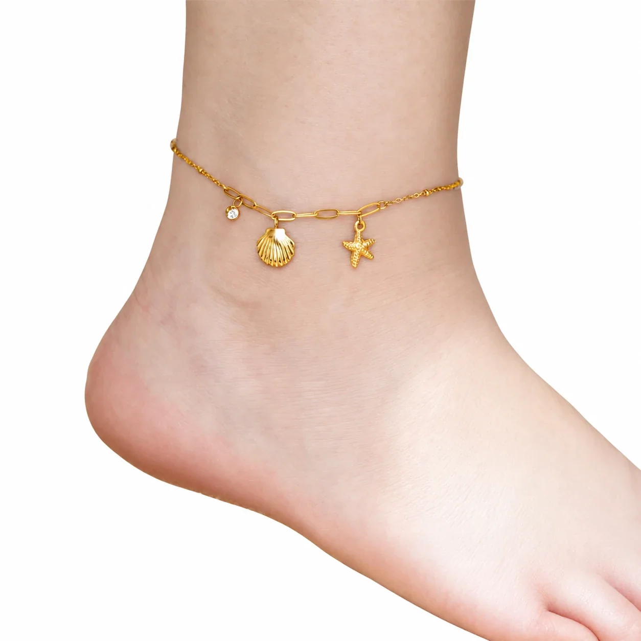 Foto del producto: Tobillera con concha acanalada, estrella de mar y cristal transparente, acero inoxidable