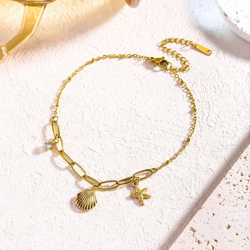 Foto del producto: Tobillera con concha acanalada, estrella de mar y cristal transparente, acero inoxidable
