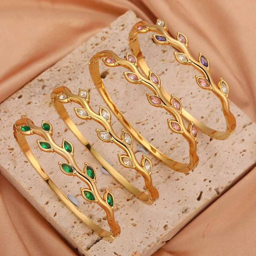Foto prodotto: Bracciale rigido a vite con cristalli marquise colorati, acciaio placcato oro