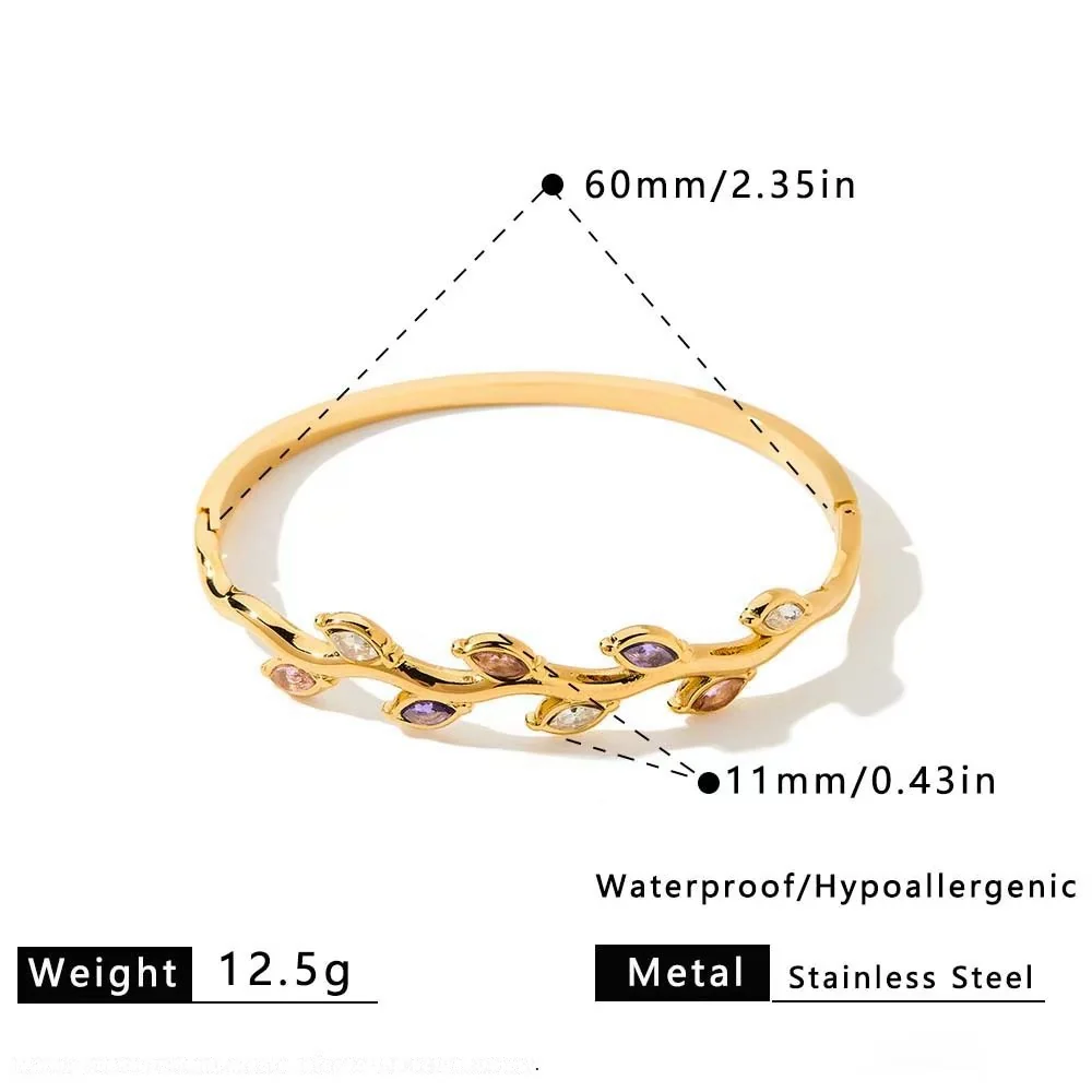 Foto prodotto: Bracciale rigido a vite con cristalli marquise colorati, acciaio placcato oro