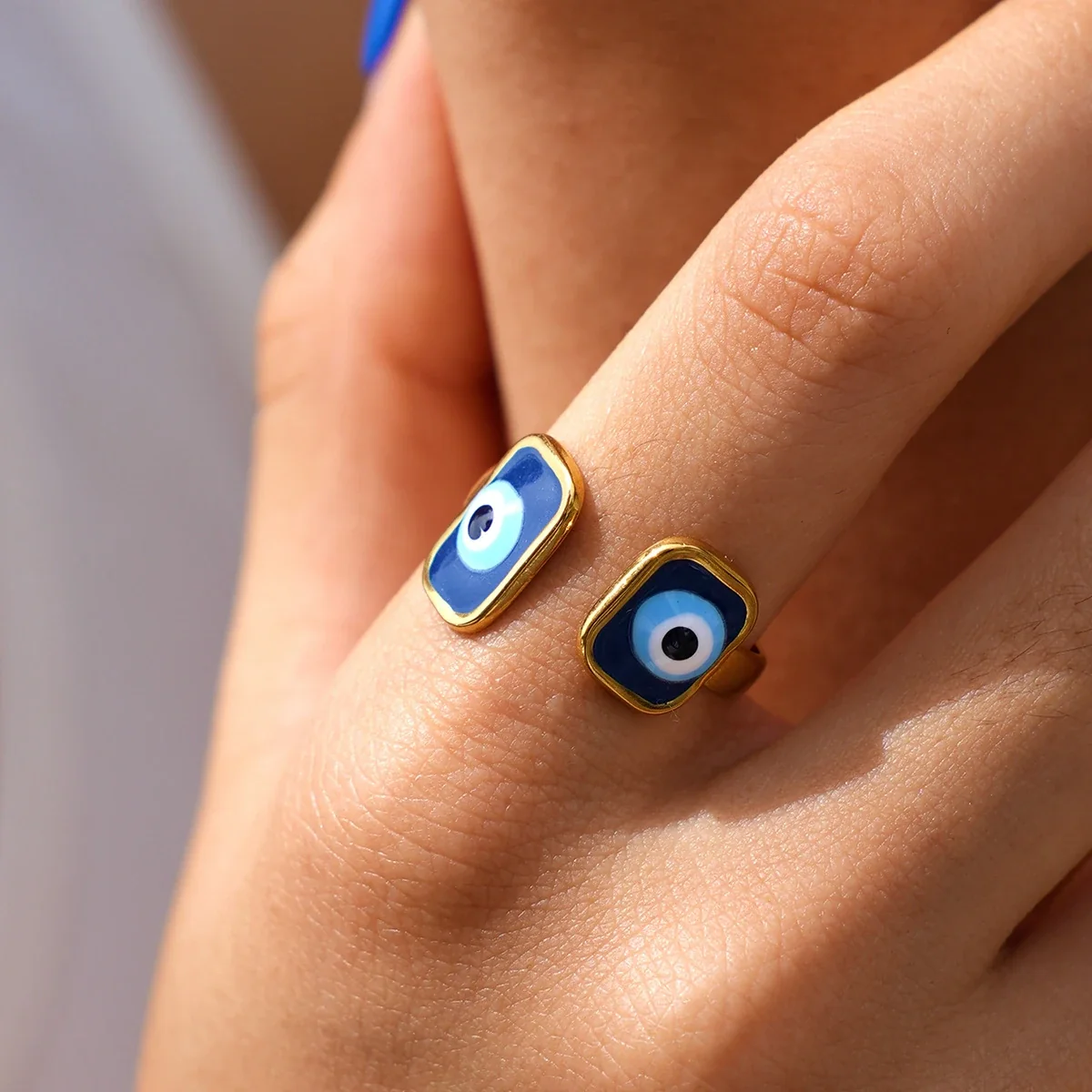 Ring: Verstelbare Dubbele Evil Eye Open, Goudkleurig PVD Roestvrij Staal productfoto