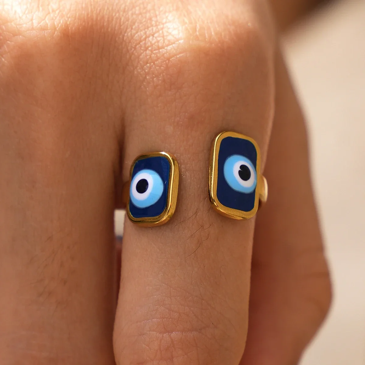 Ring: Verstelbare Dubbele Evil Eye Open, Goudkleurig PVD Roestvrij Staal productfoto