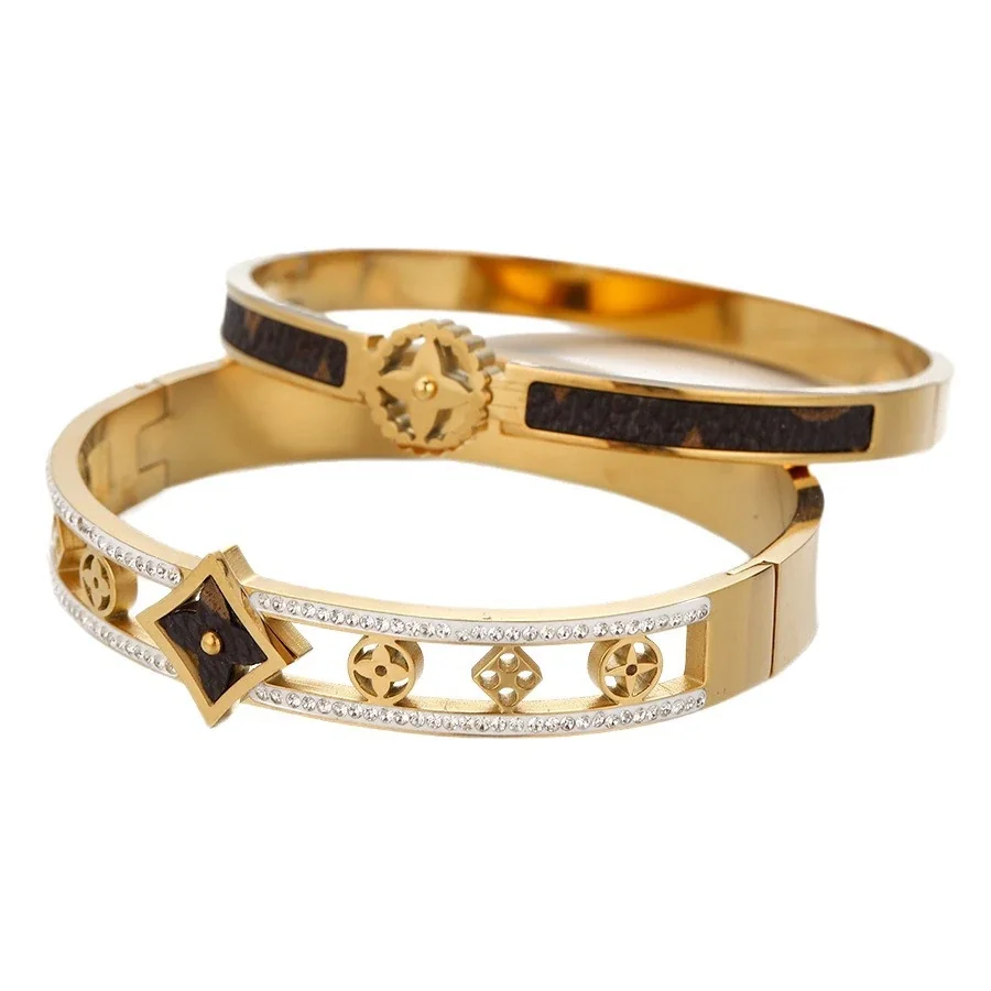 Gold-Plated Stainless Steel Bangle with Black Inlay & Crystals