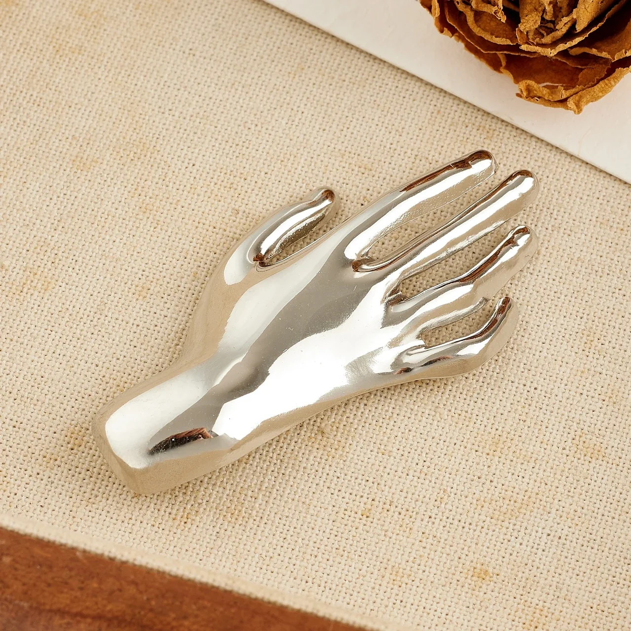 Hand Brooch with Raised Fingers in Polished Stainless Steel