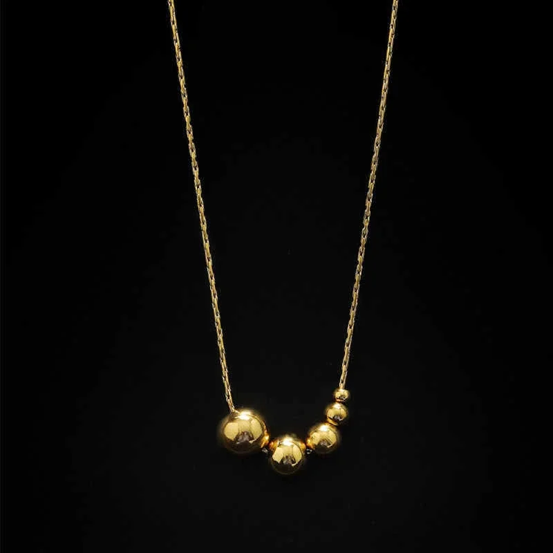 Slangenketting met vijfkralencluster van verguld roestvrij staal productfoto