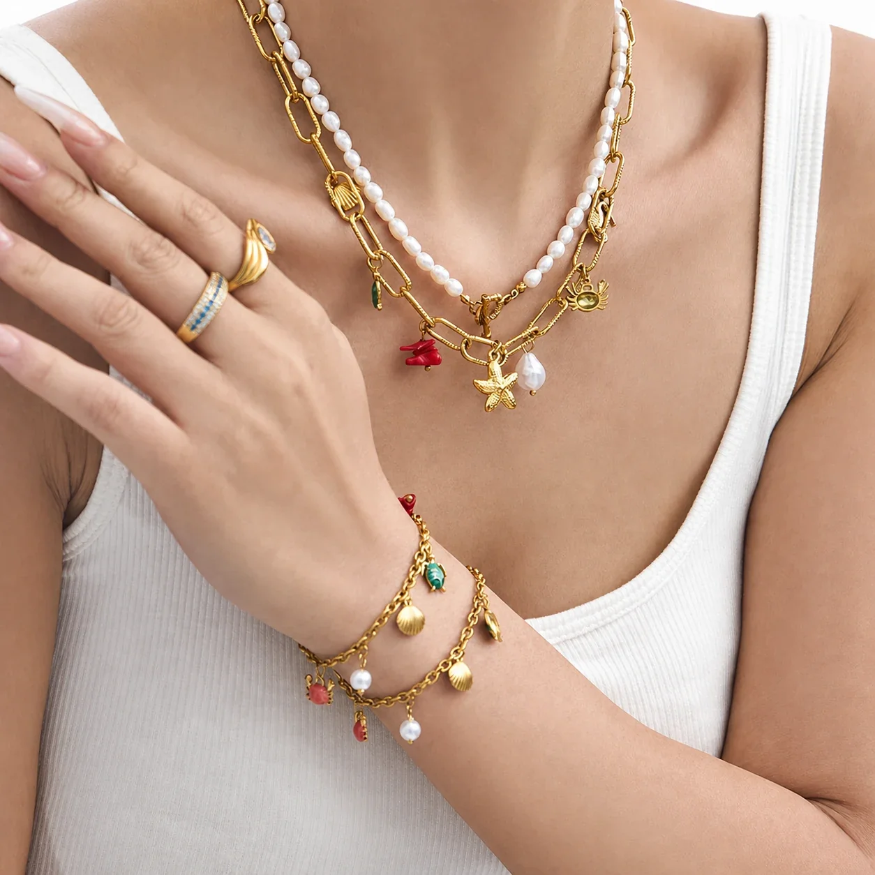 Photo produit : Parure de bijoux Coastal en acier inoxydable, breloques marines plaquées or 18K