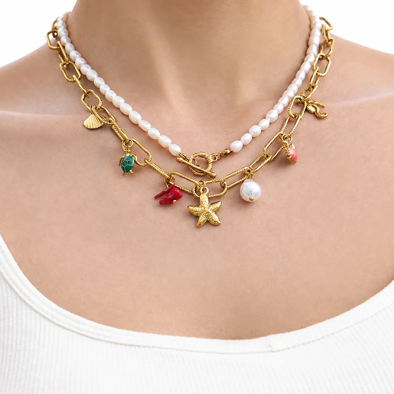 Photo produit : Parure de bijoux Coastal en acier inoxydable, breloques marines plaquées or 18K