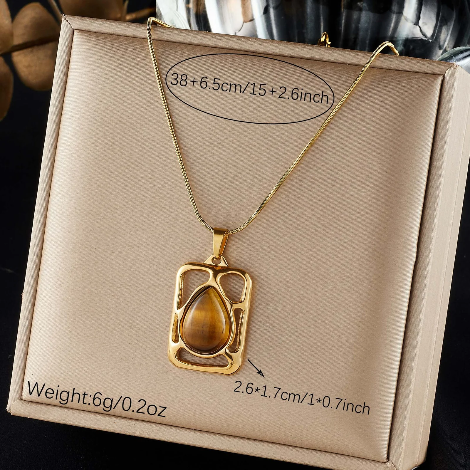 Hangerketting met tijgeroog-effecthars, verguld roestvrij staal productfoto