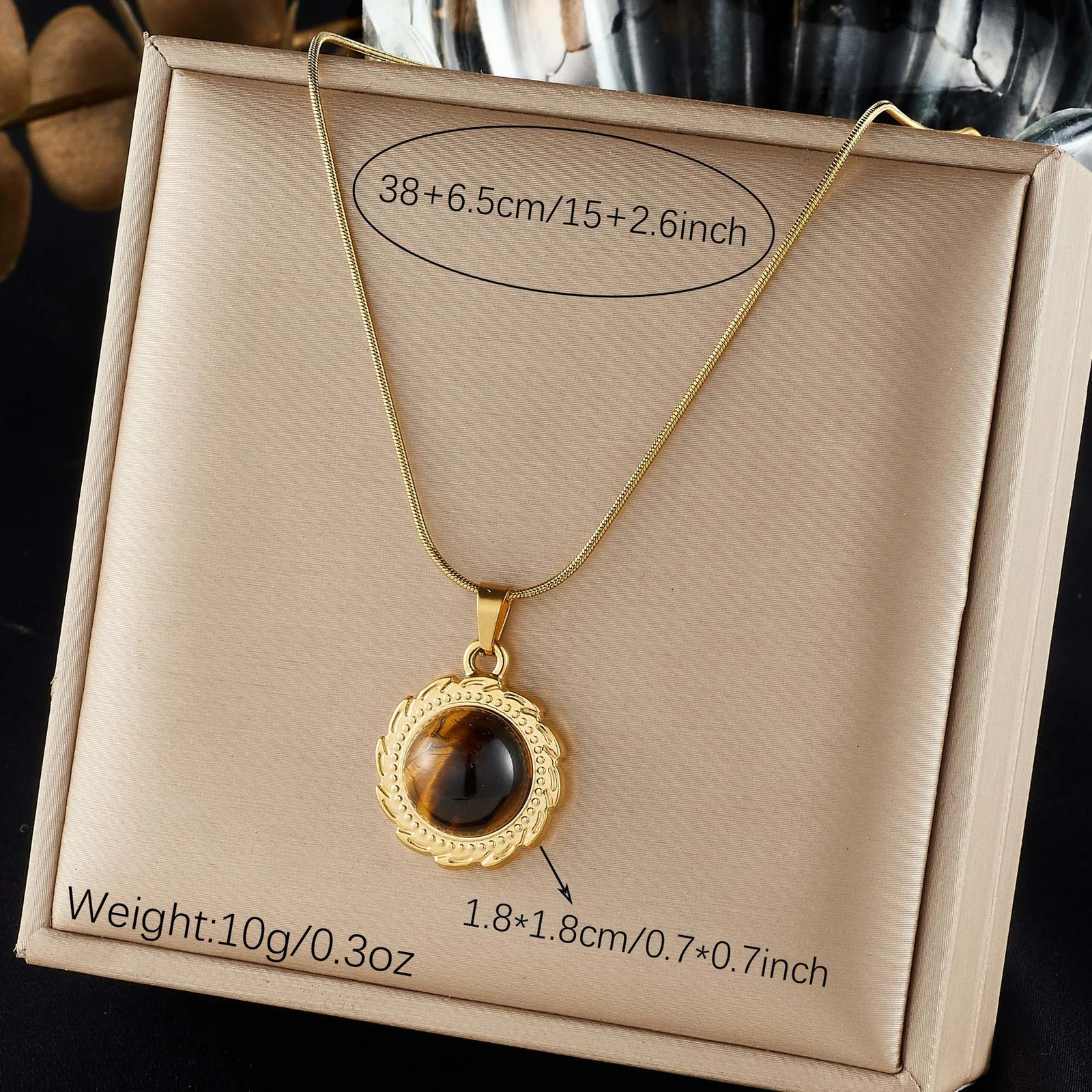 Hangerketting met tijgeroog-effecthars, verguld roestvrij staal productfoto