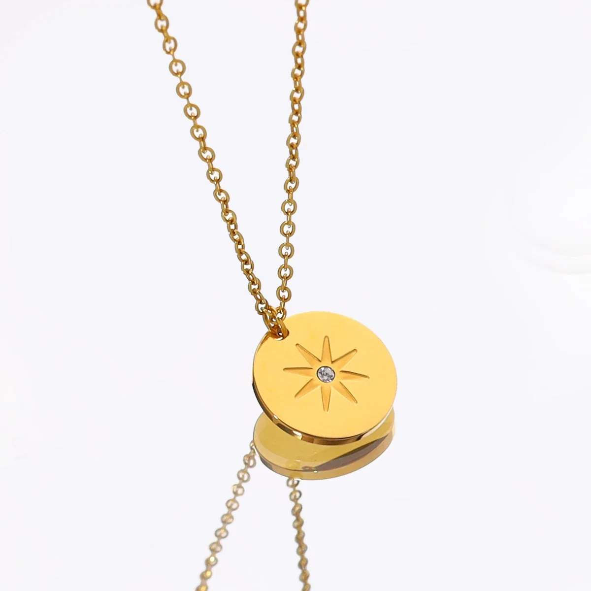 Radiant Gold-Plated Stainless Steel Star Disc Necklace