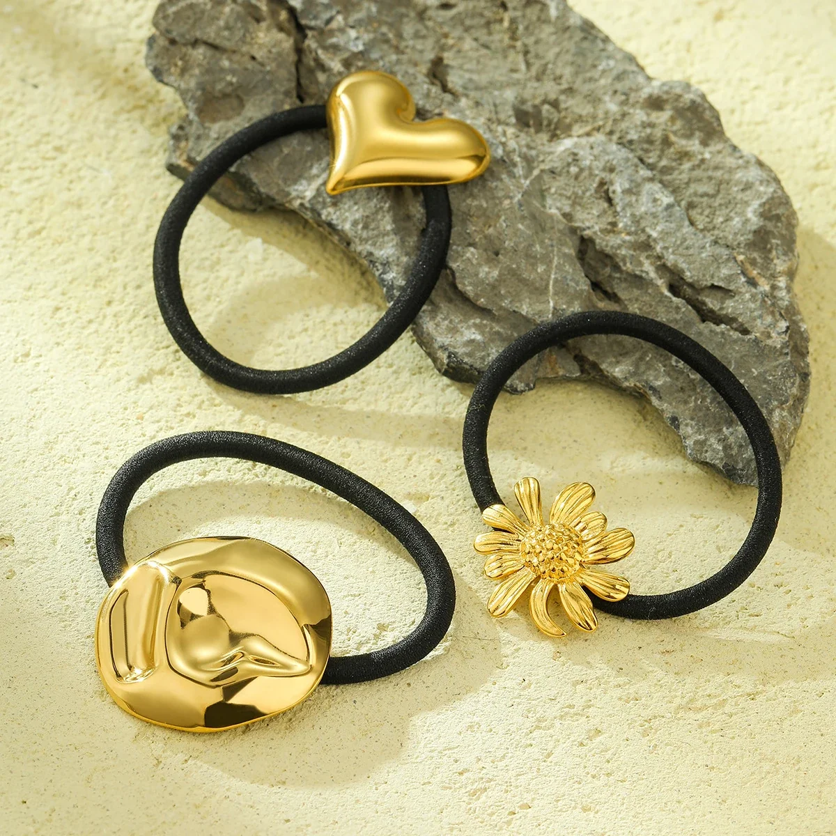 Hair Ties with Sculpted Motifs in Gold-Plated Steel