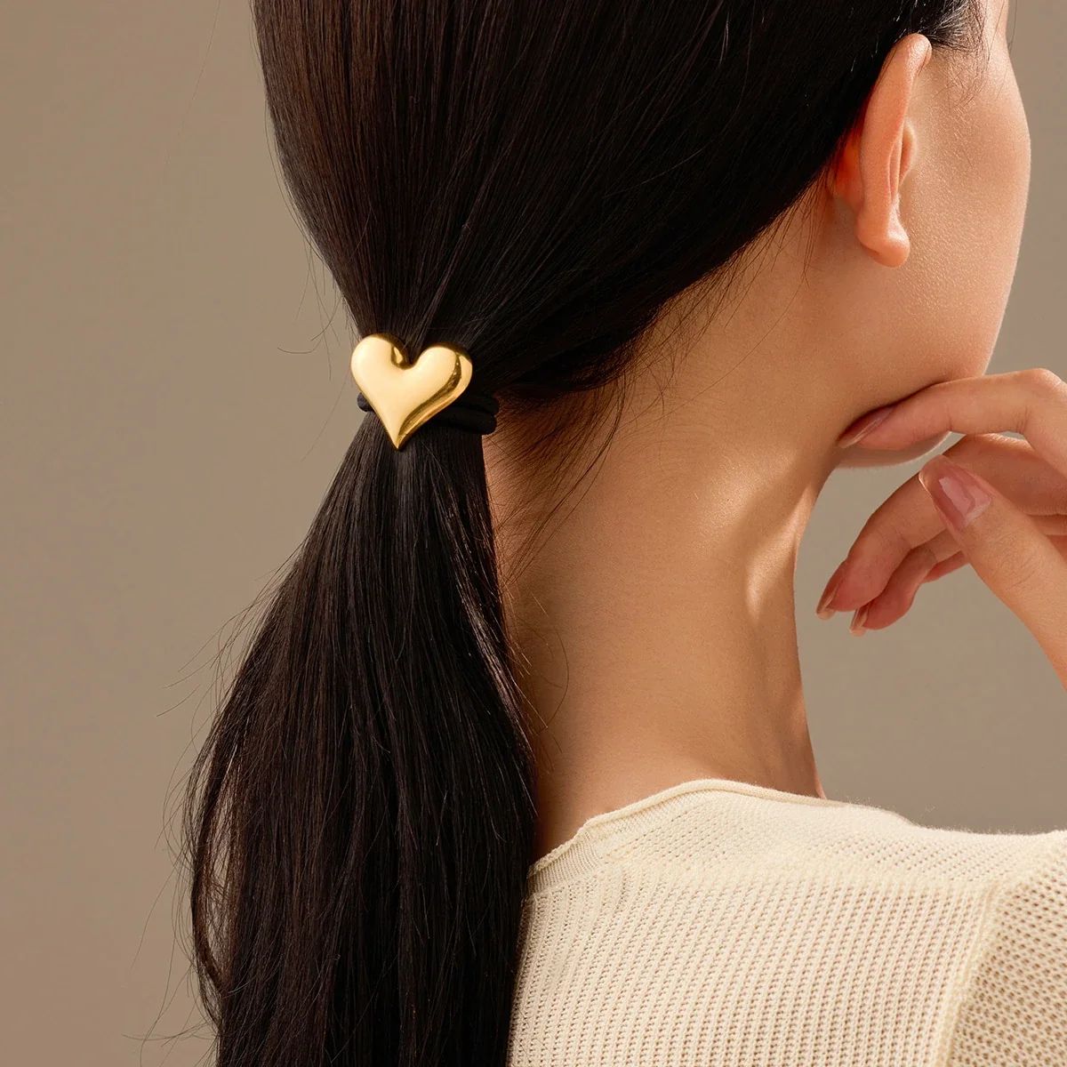 Hair Ties with Sculpted Motifs in Gold-Plated Steel