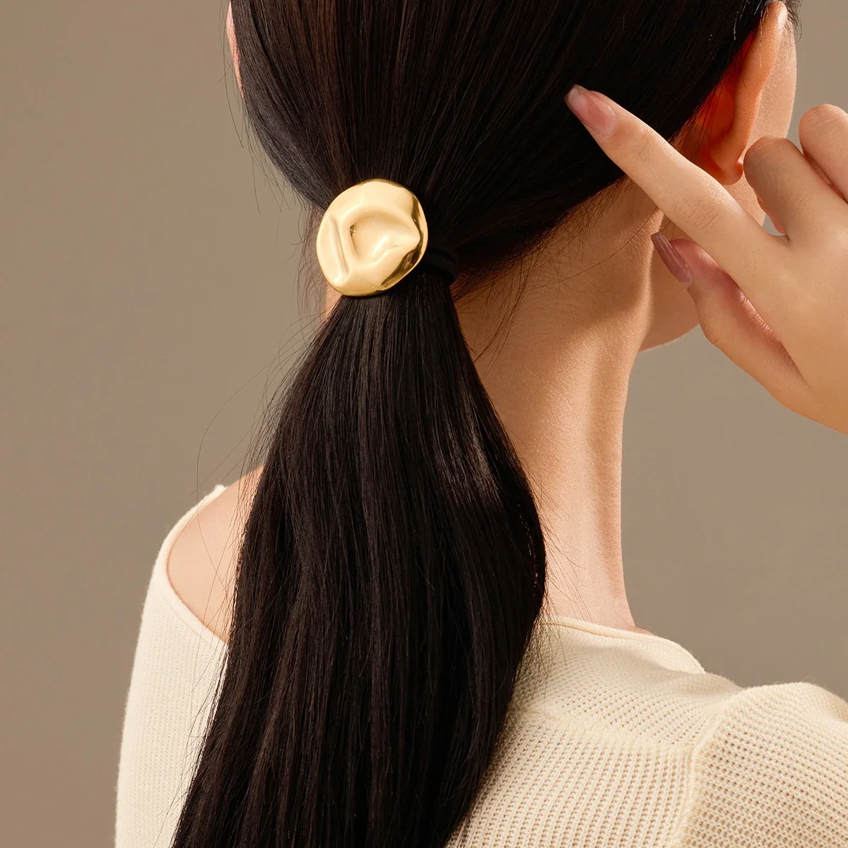 Hair Ties with Sculpted Motifs in Gold-Plated Steel