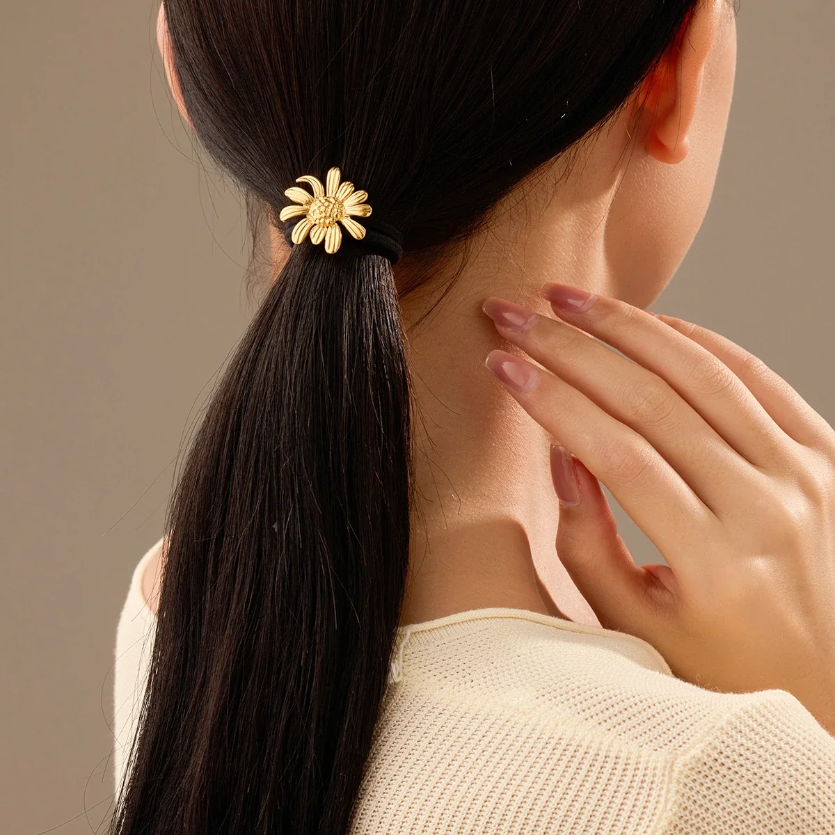 Hair Ties with Sculpted Motifs in Gold-Plated Steel