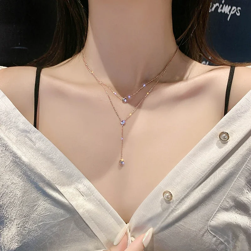 Gelaagde ketting met drie kristallen in kastzetting van roestvrij staal productfoto
