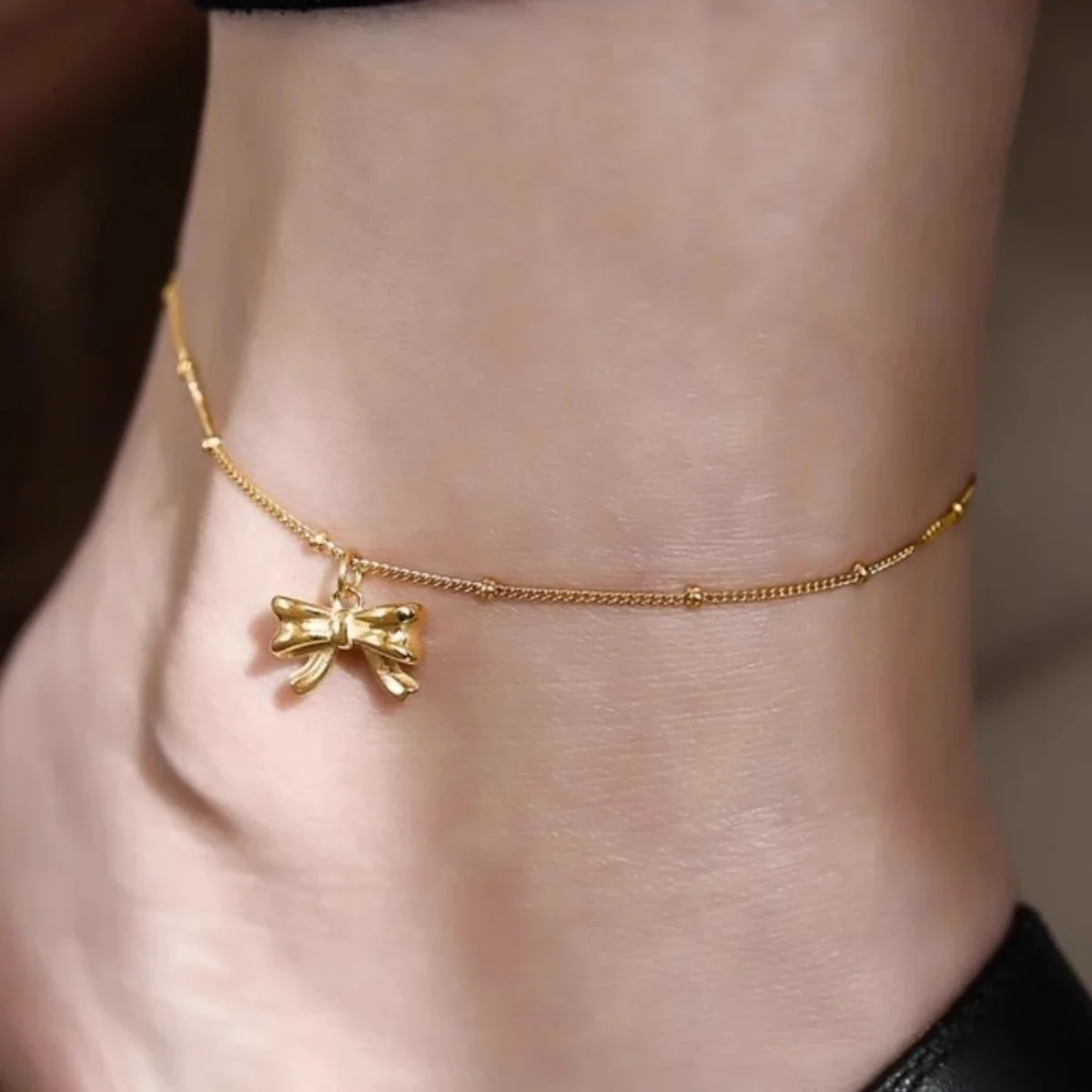 Anklet with Sculpted Bow Charm and Beaded Stainless Steel Chain