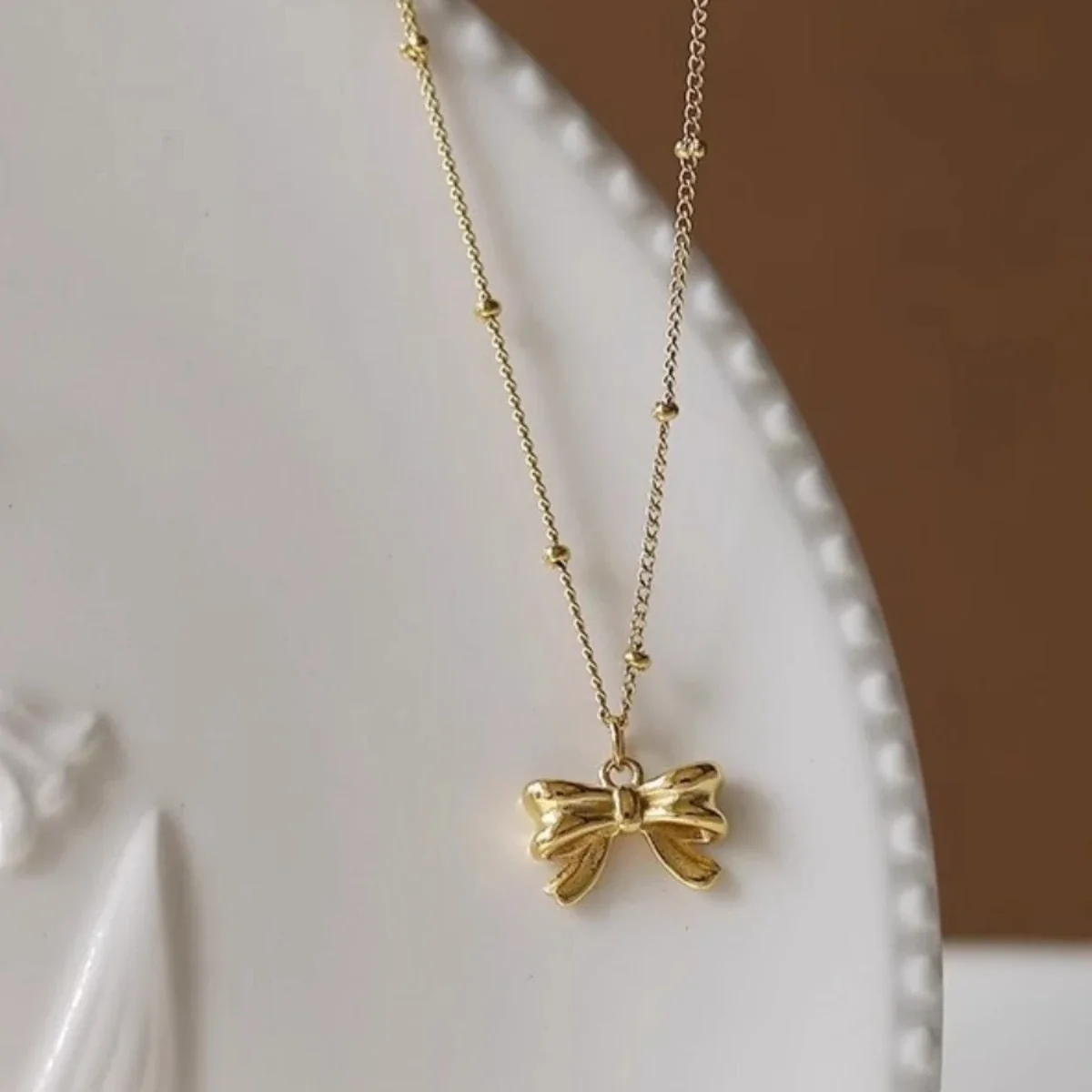 Anklet with Sculpted Bow Charm and Beaded Stainless Steel Chain