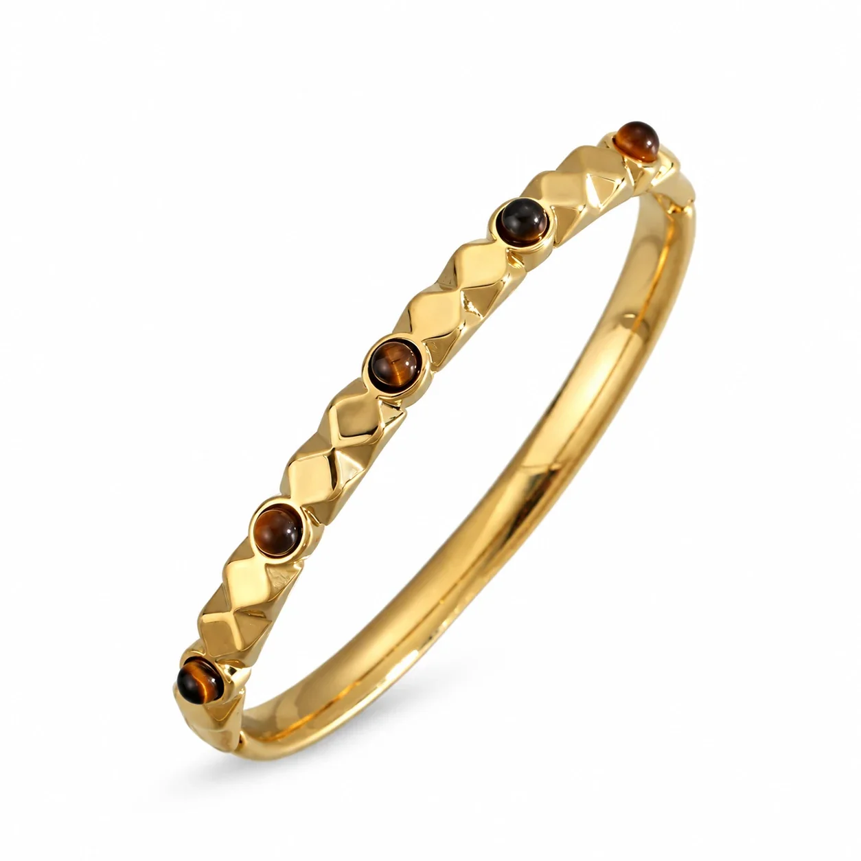 Foto del producto: Brazalete rígido con cristal ovalado marrón y acero chapado en oro