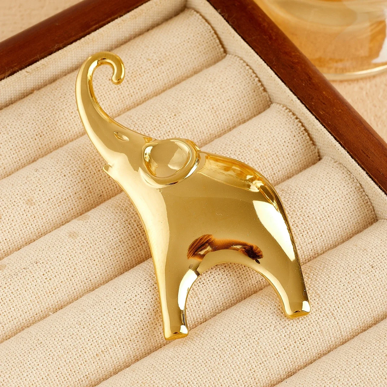 Elephant Brooch with Curled Trunk and Raised Ear, Gold-Plated