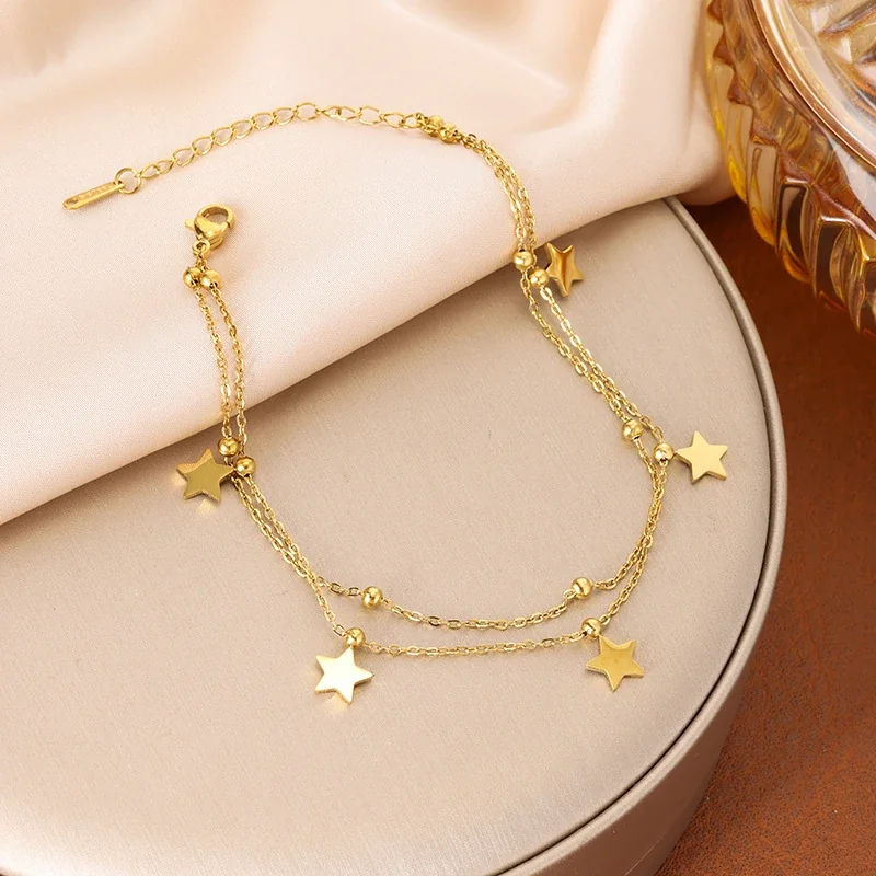 Foto del producto: Tobillera de acero chapada en oro de 18K, estrellas y cuentas de doble cadena