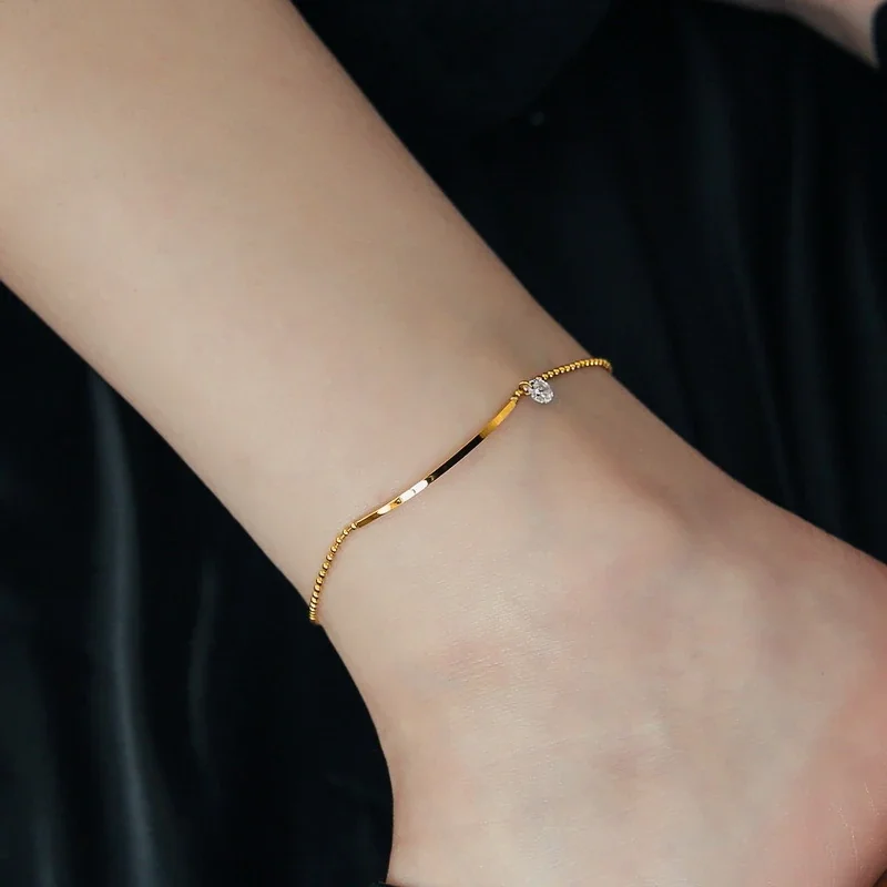 Anklet with Curved Bar and Round CZ, Gold-Tone Steel