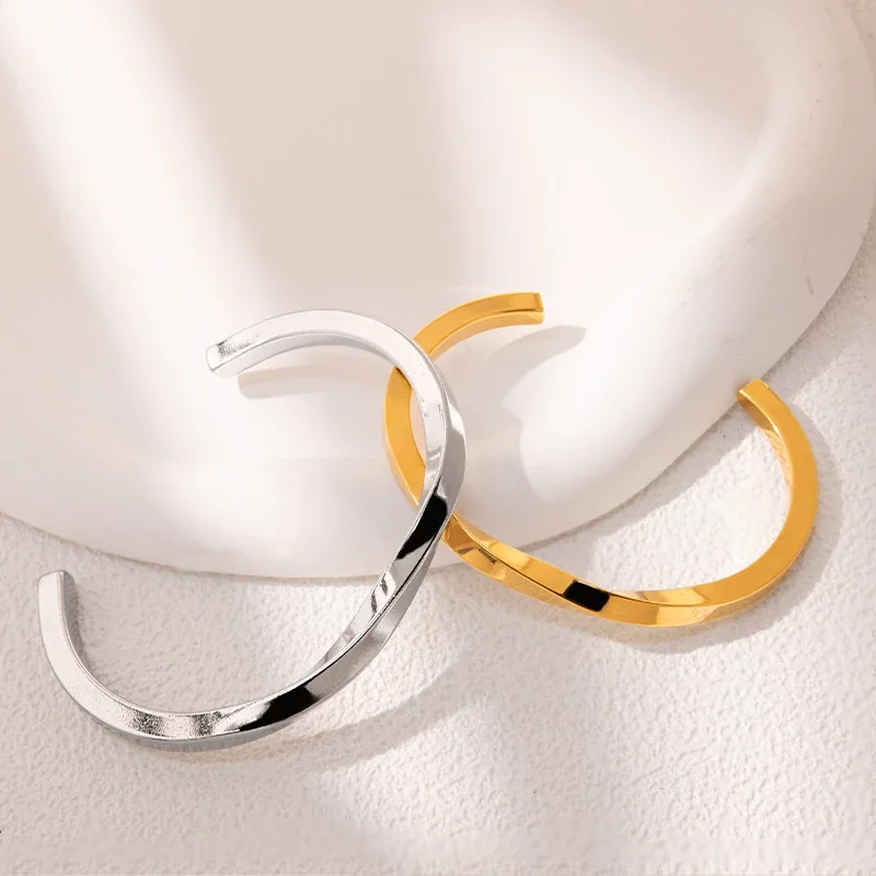 Open Twist Cuff Bracelet in Stainless Steel with Gold PVD