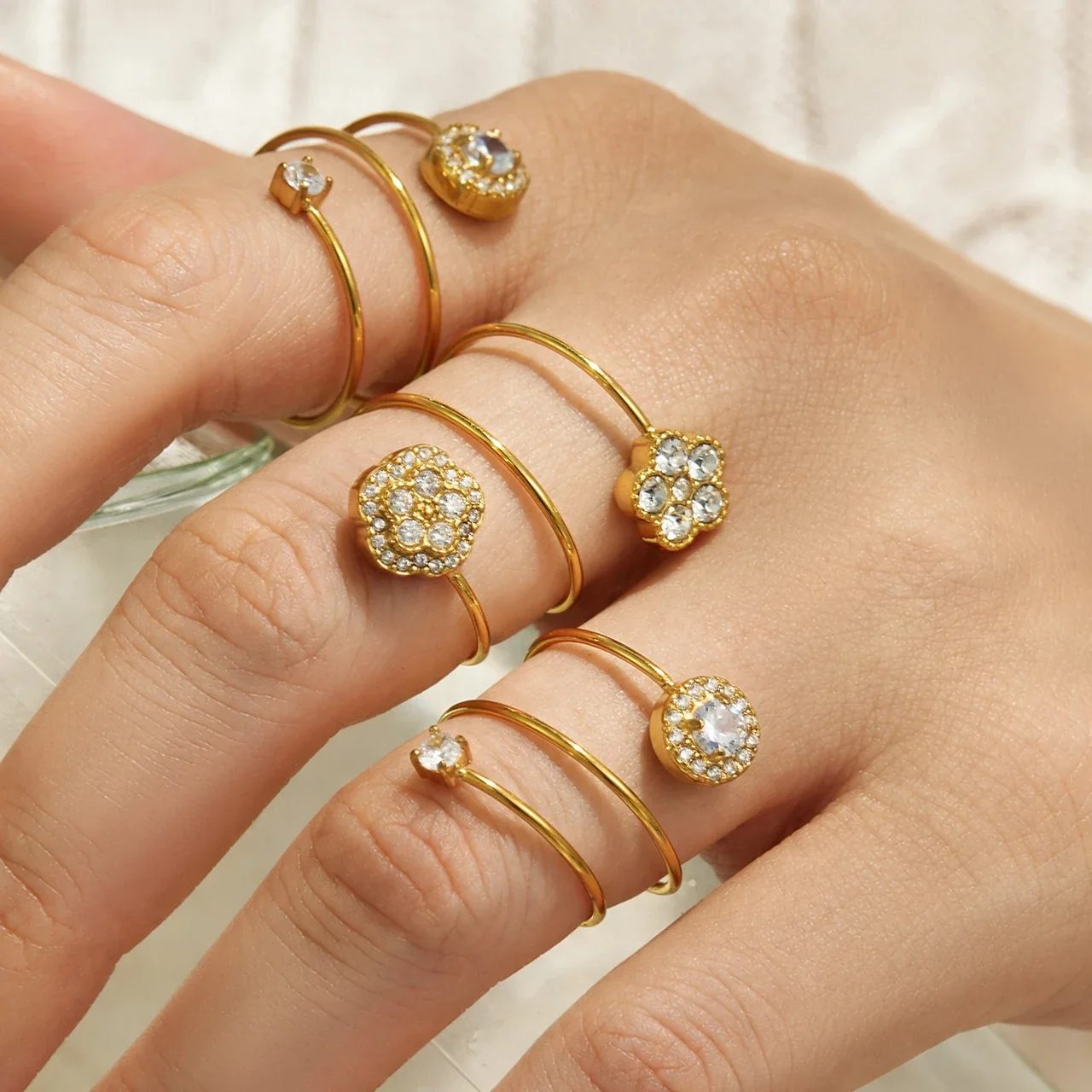 Ring: Open Flower and Halo CZ Stainless Steel Gold PVD