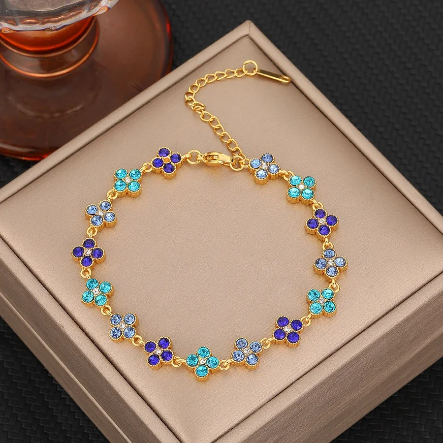 Foto prodotto: Bracciale a Maglie Floreali con Cristalli in Acciaio Inossidabile Placcato Oro