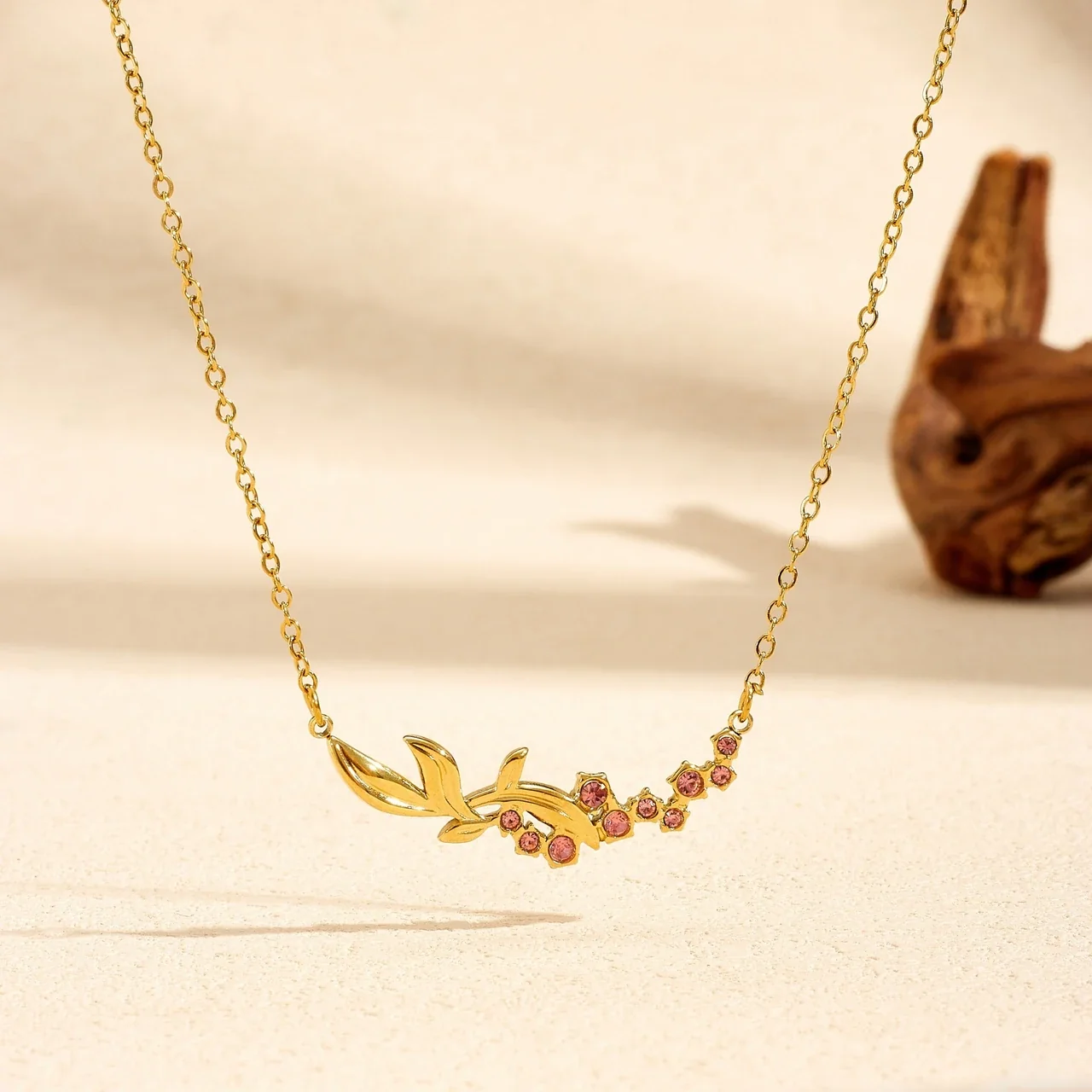 Ronde Kristallen Ketting met Bladtak in Verguld Roestvrij Staal productfoto
