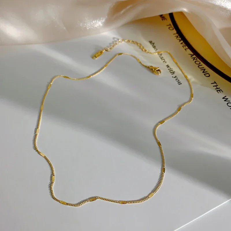 Schakelketting met rechthoekige elementen, 18K verguld staal productfoto