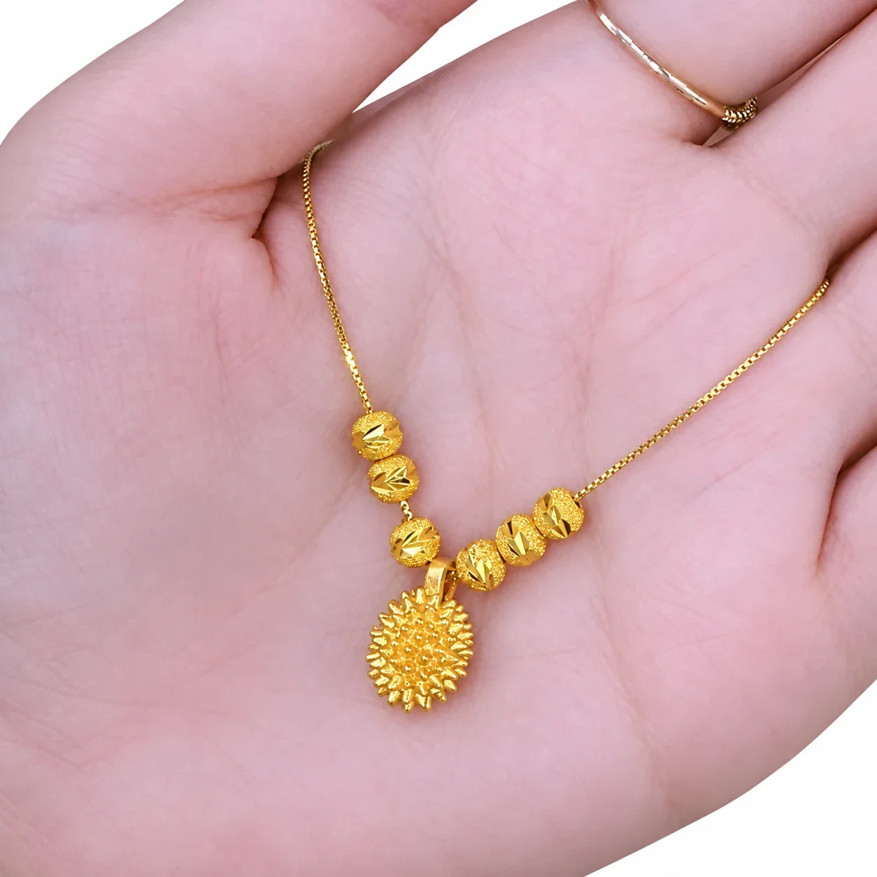Hangerketting met structuurbol en staafschakels, goudverguld staal productfoto