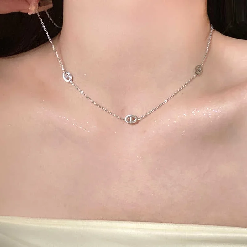Ketting: Ovaal Openwerkmotief Verguld Roestvrij Staal productfoto