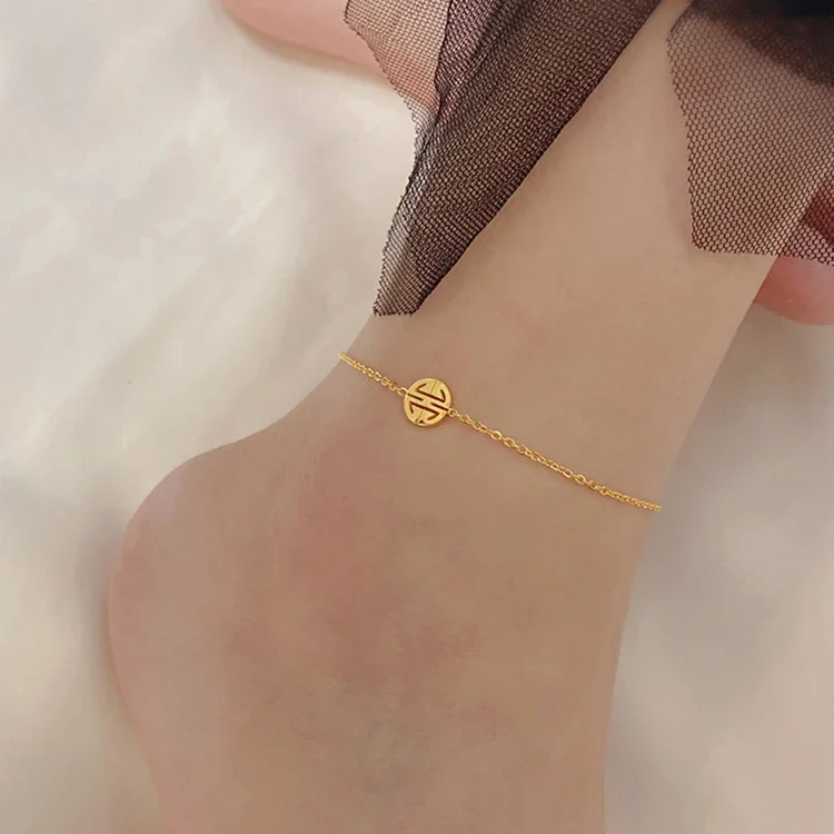 Foto del producto: Tobillera con Símbolo Redondo de Longevidad y Cadena Fina en Tono Dorado